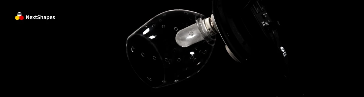 Close-up of a 3D printed transparent lamp shade component made with NextShapes 8001 transparent resin, showcasing 90.6% light transmittance, bubble-free clarity, and precise dimensional stability