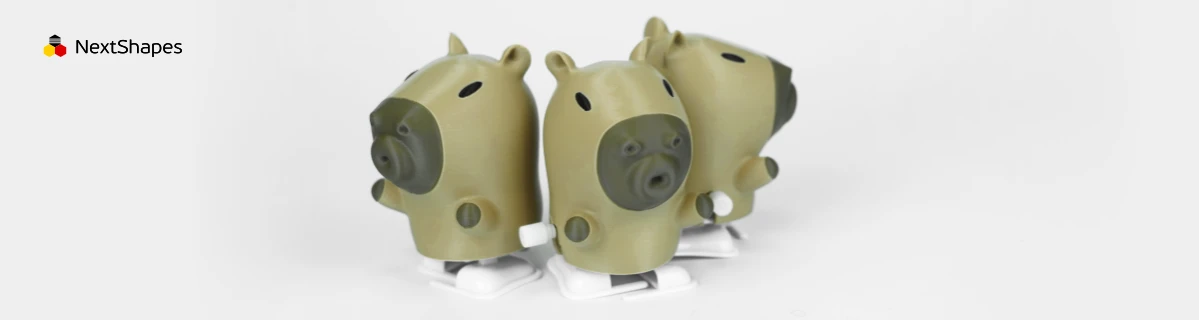 Group view of 3D printed capybara figures made with NextShapes Standard PLA filament, showcasing precise detail reproduction, smooth mirror-like surface finish, and adorable charm