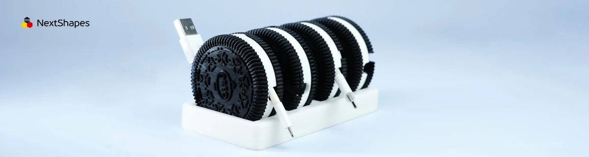 Multi-set view of 3D printed Oreo-shaped data cable storage boxes made with NextShapes Standard PLA filament, demonstrating functional cable management, precise dimensional accuracy, and durable smooth-opening design
