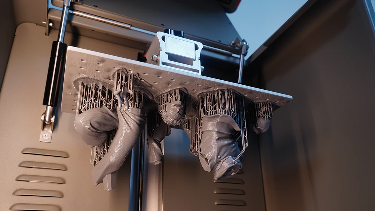 Display of complex character models on print bed made with NextShapes Standard Pro Resin, highlighting high detail fidelity and balanced strength & toughness