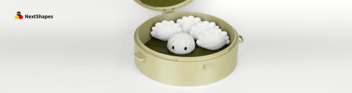 Open view of a 3D printed steamer container holding cute baozi figurines, created with NextShapes Standard PLA filament, showcasing fine detail reproduction and dimensional accuracy.