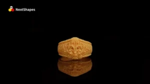 Front view of a 3D printed intricate jewelry ring made with NextShapes High Resolution 8K Pro Red Ceramic Resin, showcasing precise restoration of subtle crocodile patterns and exquisite surface details