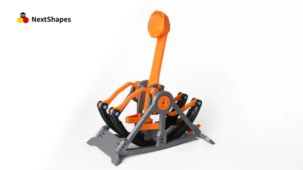 Close-up of the 3D printed leaf spring catapult, showcasing the durable, repeatedly bendable curved parts printed with NextShapes Standard PLA filament.