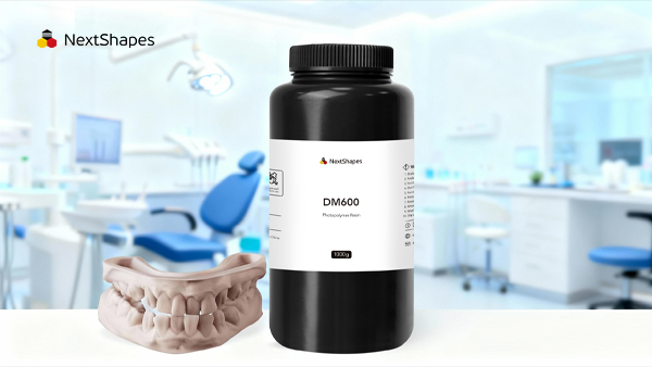 NextShapes DM600 dental 3D printing resin bottle next to a detailed 3D printed dental model in a modern dental clinic
