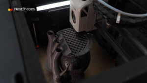 High-speed 3D printing of a complex mechanical part using NextShapes Standard PLA filament, demonstrating stable melt flow and fine detail preservation
