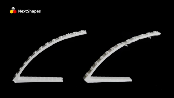 Side-by-side comparison test of 3D printed curved parts: NextShapes Standard PLA (left) vs other brands' standard filaments (right), demonstrating superior dimensional stability and smooth surface finish
