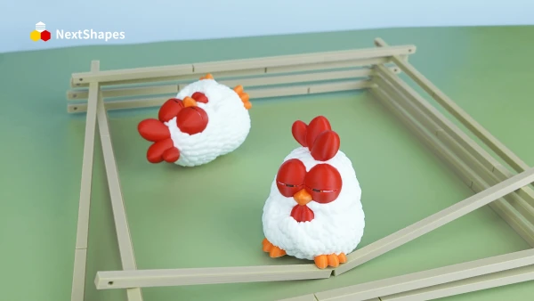Duo view of 3D printed cute chicken figures made with NextShapes Standard PLA filament, showcasing smooth fluffy texture, vibrant color, and consistent batch quality