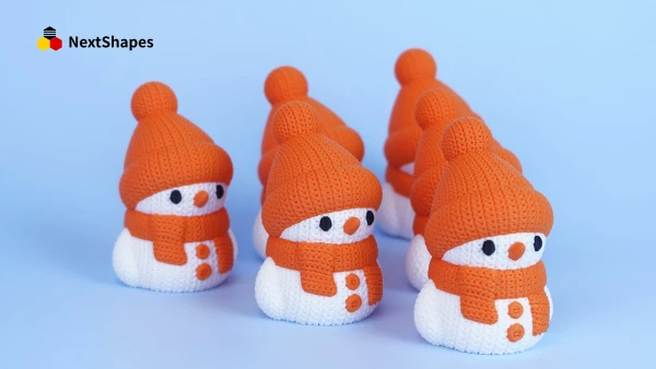 Group view of 3D printed snowman figures made with NextShapes Standard PLA filament, showcasing clog-free printing results, smooth texture, and consistent quality
