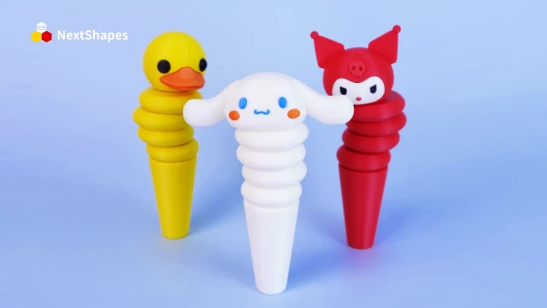 Collection of 3D printed cartoon toys (rubber duck, Cinnamoroll, red cat figure) made with NextShapes Standard PLA filament, showcasing precise diameter control, smooth surface finish, and vibrant color