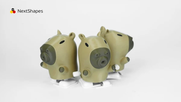 Group view of 3D printed capybara figures made with NextShapes Standard PLA filament, showcasing precise detail reproduction, smooth mirror-like surface finish, and adorable charm