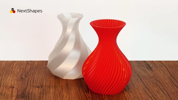 Display of 3D printed dual-color twisted vase set made with NextShapes PETG filament, showcasing smooth surface finish, strong layer adhesion, and vibrant color consistency