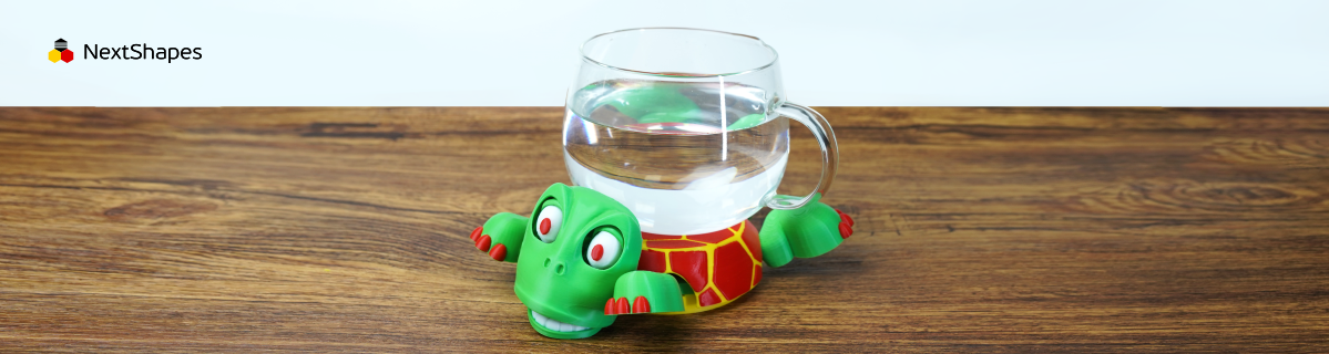Durable 3D printed turtle coaster by NextShapes Standard PLA, holding a glass to demonstrate strength.