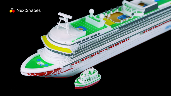 Front view of a detailed cruise ship model and a smaller tugboat model, both 3D printed with NextShapes Standard PLA filament, showcasing vibrant colors and precise construction against a black background.