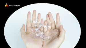 Hands holding multiple crystal-clear petal-shaped 3D printed samples made with NextShapes 8001 transparent resin, showcasing zero bubbles and high light transmittance.