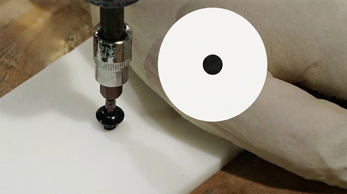 Drilling and tapping test display of 3D printed part made with NextShapes ABS Like Plus Resin, highlighting machinability and thread strength