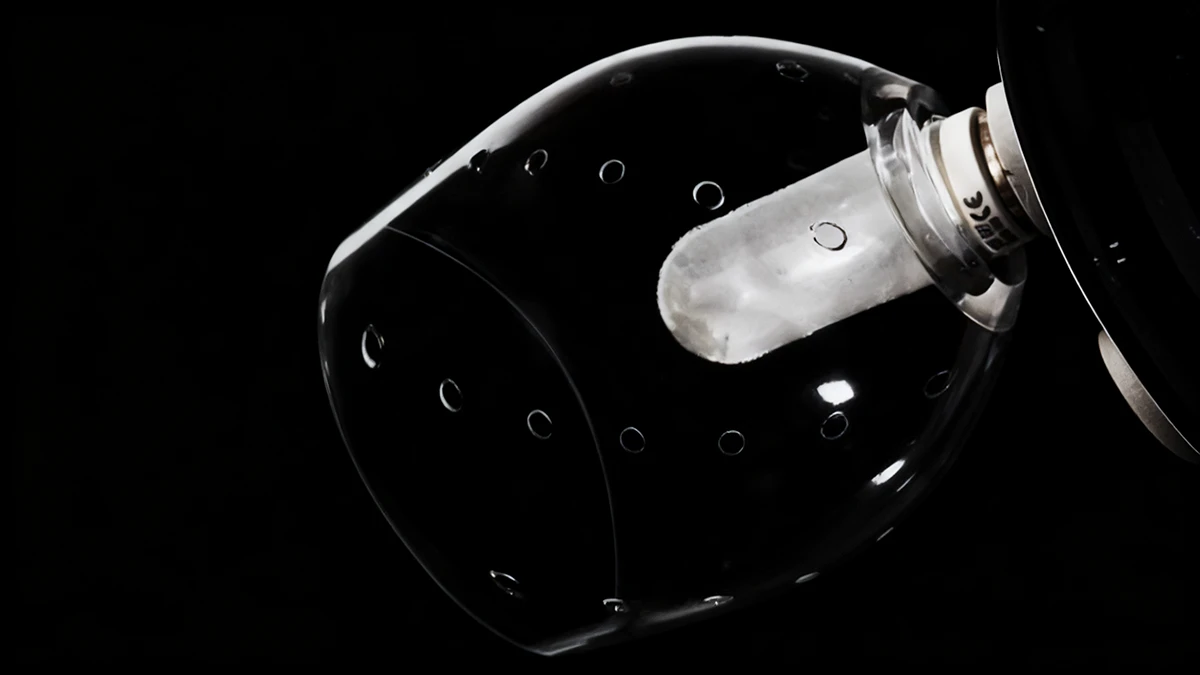 Display of 3D printed transparent prototype component made with NextShapes Clear Pro Resin, showcasing high optical clarity and internal structure visibility