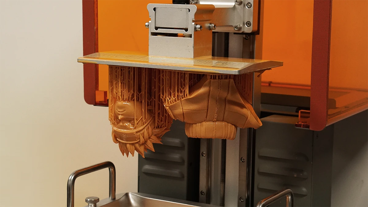 Array of 3D printed Wukong models on print bed made with NextShapes Hight Resolution 8K Pro Resin, demonstrating batch production capability and consistent high detail