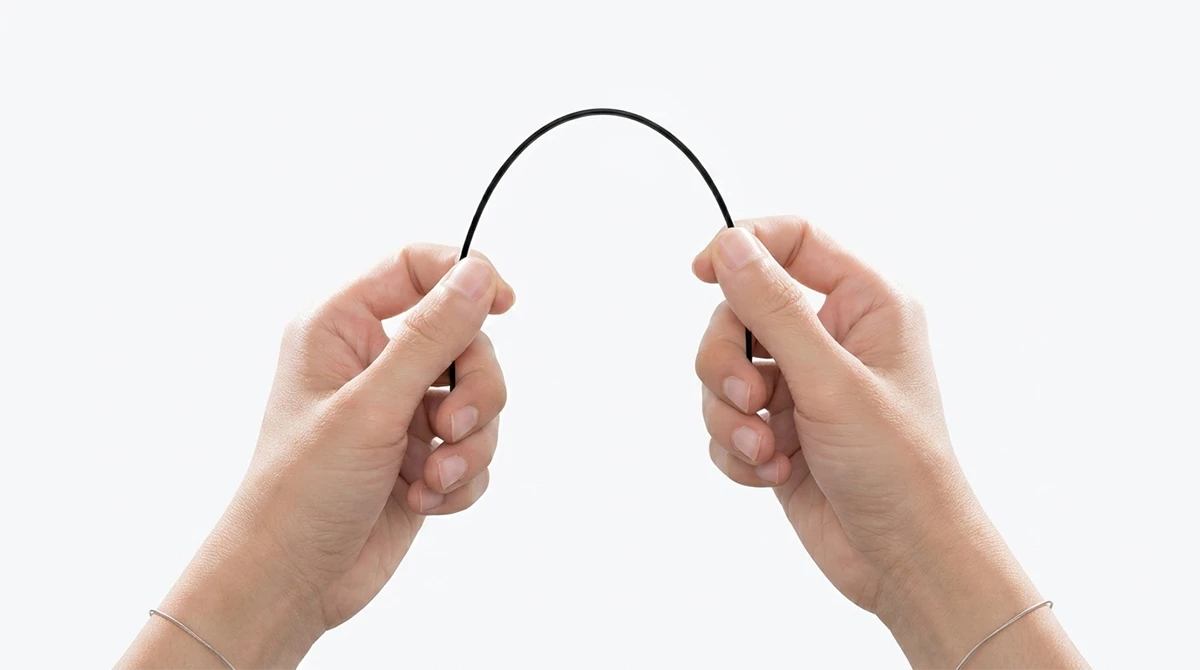 Bending test display of NextShapes PLA CF filament, demonstrating exceptional stiffness and resistance to deformation