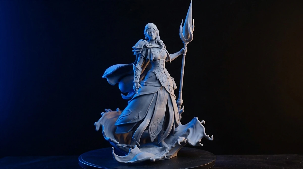 Display of 3D printed fantasy female character figurine made with NextShapes Standard Pro Resin, showcasing flowing fabric texture and fine detail reproduction