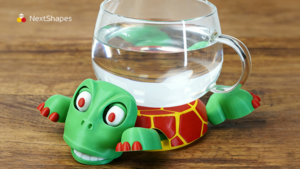 3D printed turtle character figure made with NextShapes Standard PLA filament placed on a desk, showing the smooth finish and dimensional stability of the material