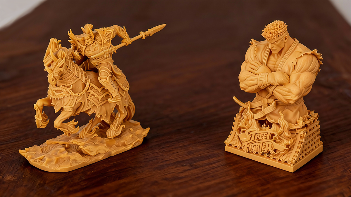 Two detailed 3D prints: a mounted warrior and Street Fighter character bust, printed with 8K Pro red ceramic resin