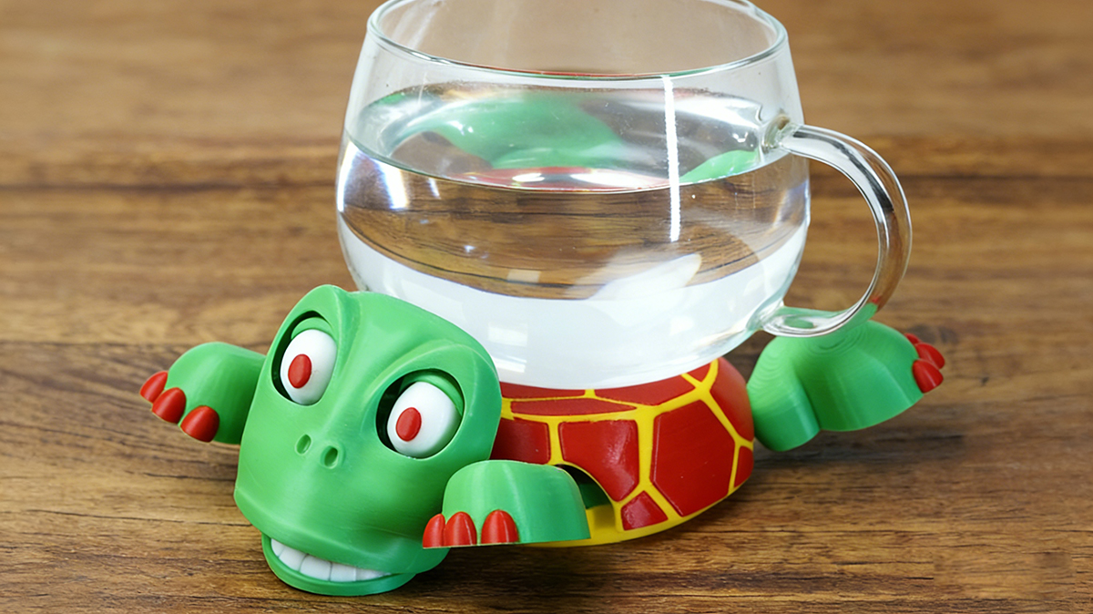 3D printed turtle character figure made with NextShapes Standard PLA filament placed on a desk, showing the smooth finish and dimensional stability of the material