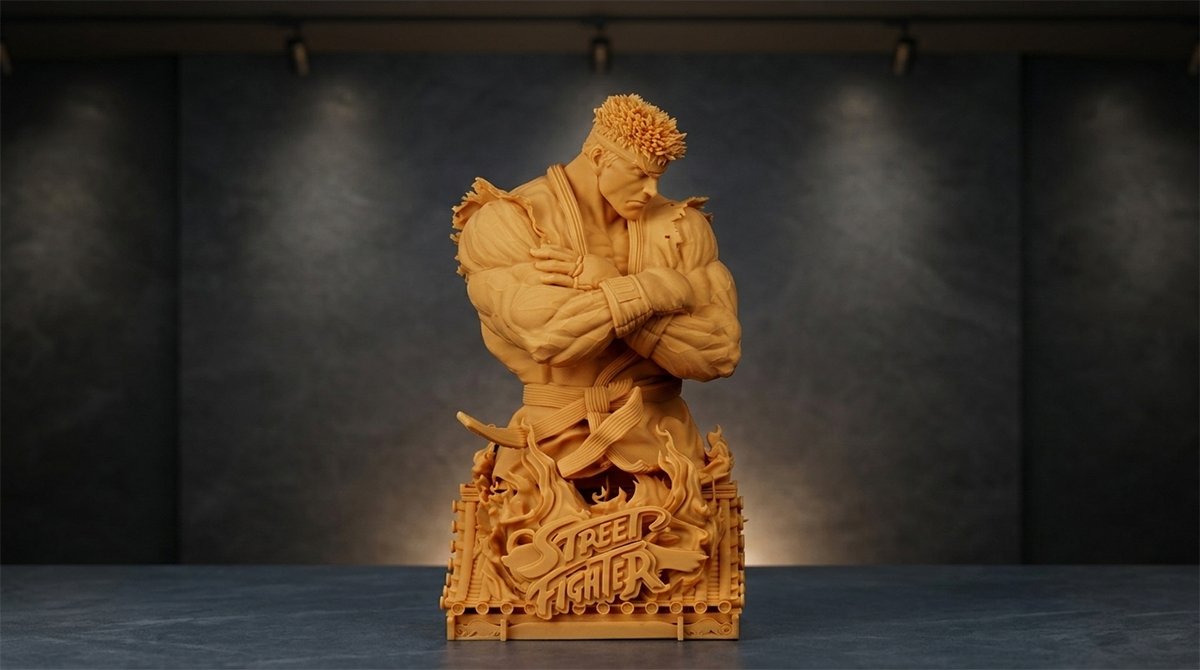 Orange 3D printed Street Fighter-style anime statue with intricate details, showcasing sharp edges and clean texture from NextShapes 8K Pro resin